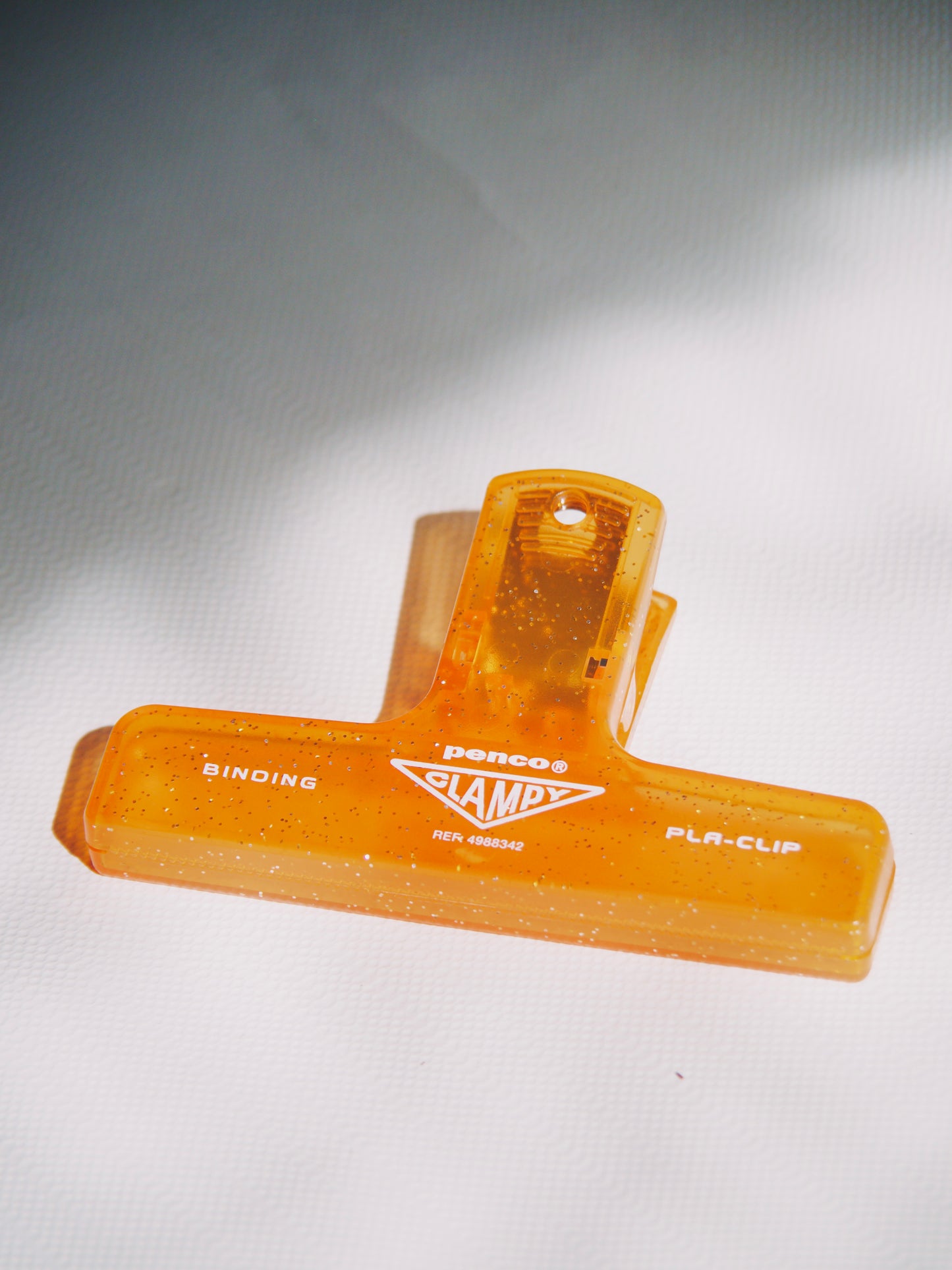 Pince Penco orange pailletée