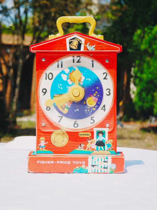 Horloge musicale vintage Fisher-Price « Teaching Clock » / « Music Box Clock » (Années 60/70)