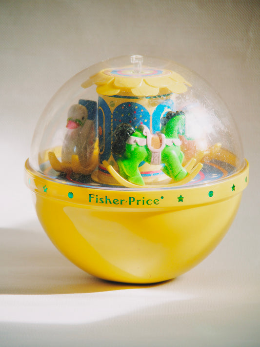 Culbuto jaune Fisher Price